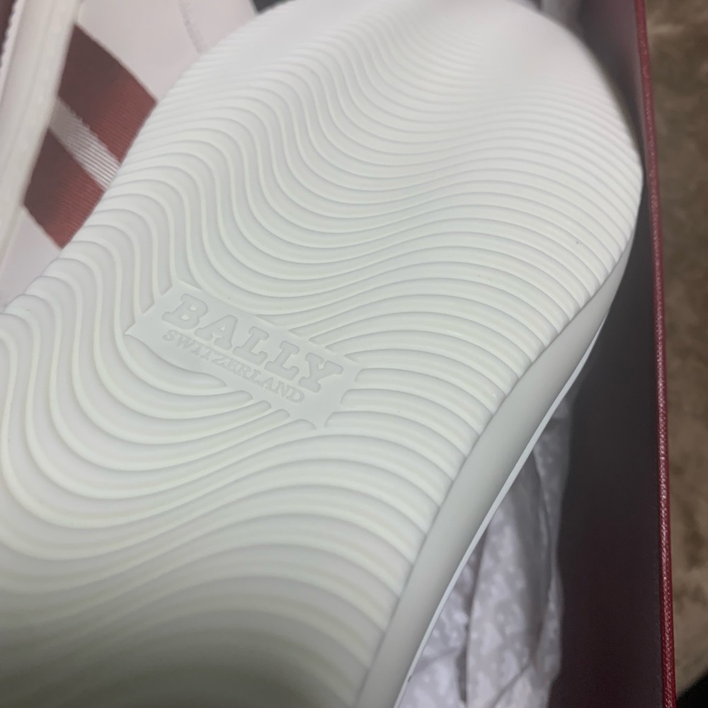 Bally luxury sneakers never worn so they are brand new.